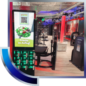 Digitaler DOOH-Werbescreen mit Migros Truly Good Werbung im Fitnessstudio – Fitness DOOH